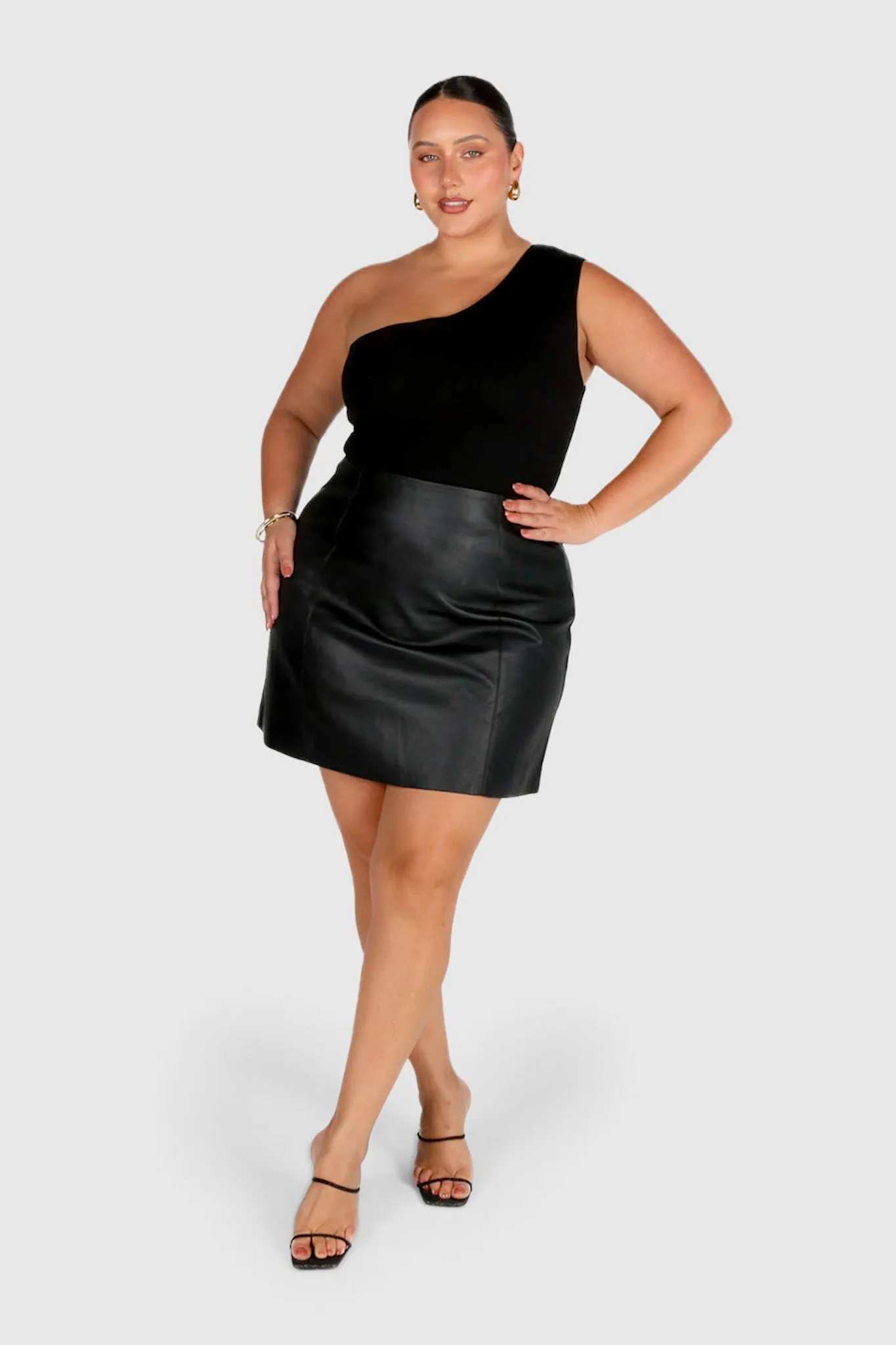 REVOLVER PU LEATHER SKIRT BLACK